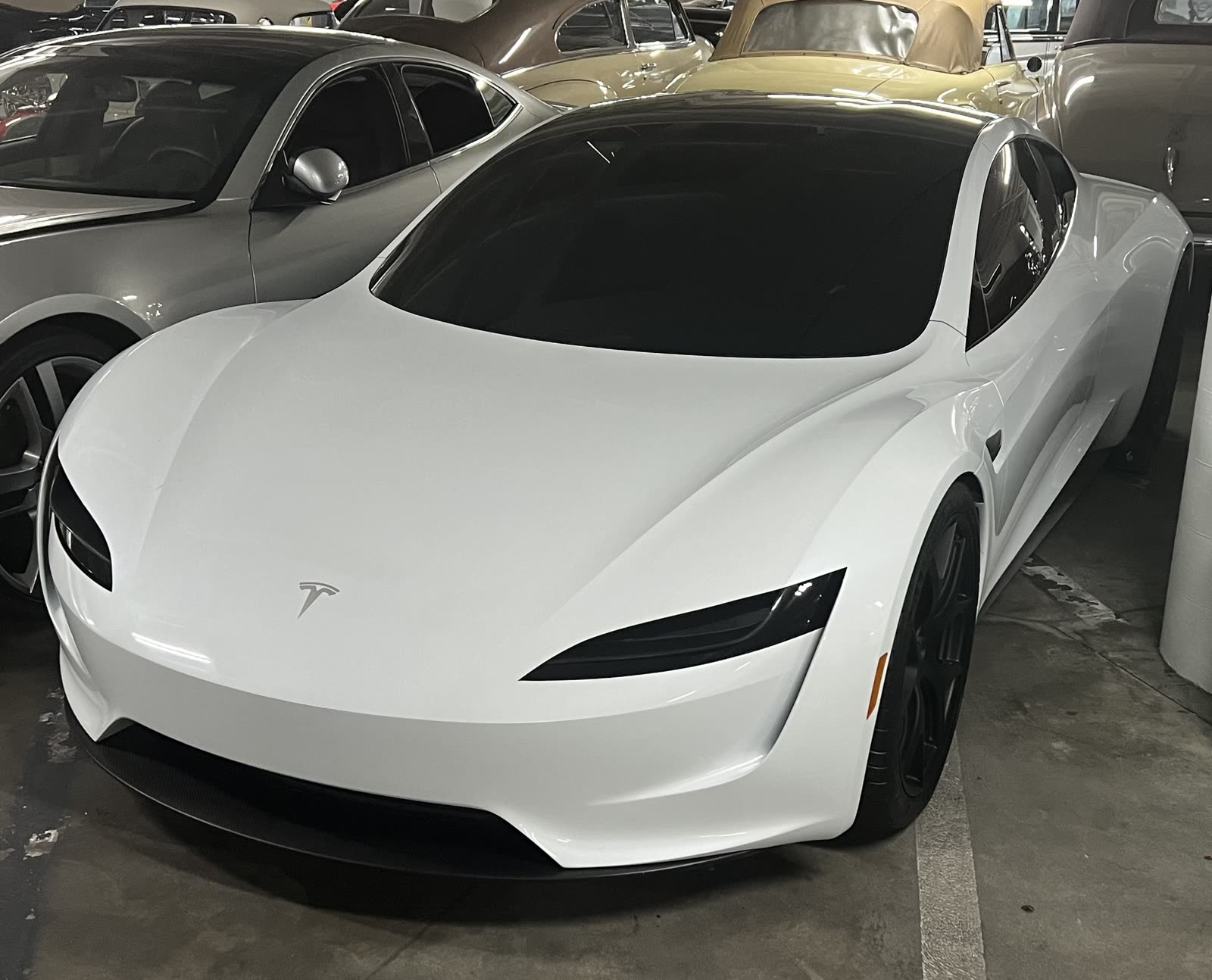 Red Tesla Roadster prototype in a museum